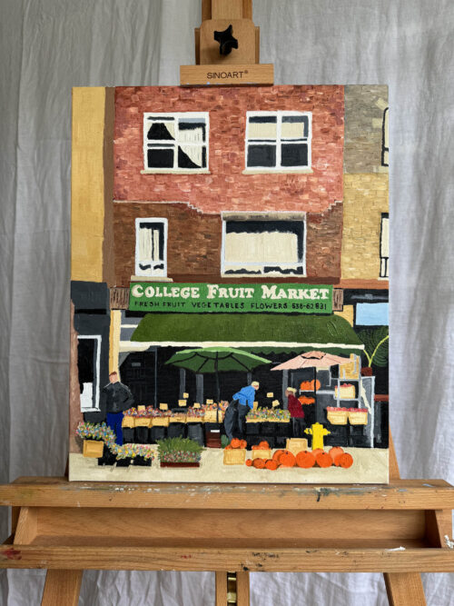 The original College Fruit Market painting done in oil on canvas, sitting on an easel.